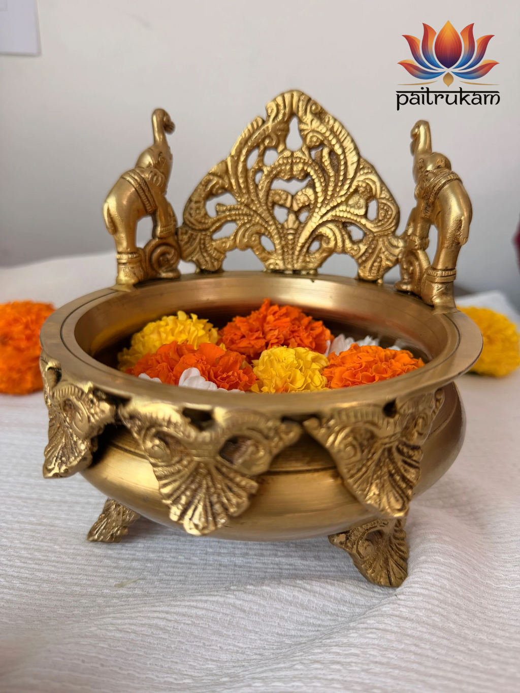 Uruli with Elephant Carving